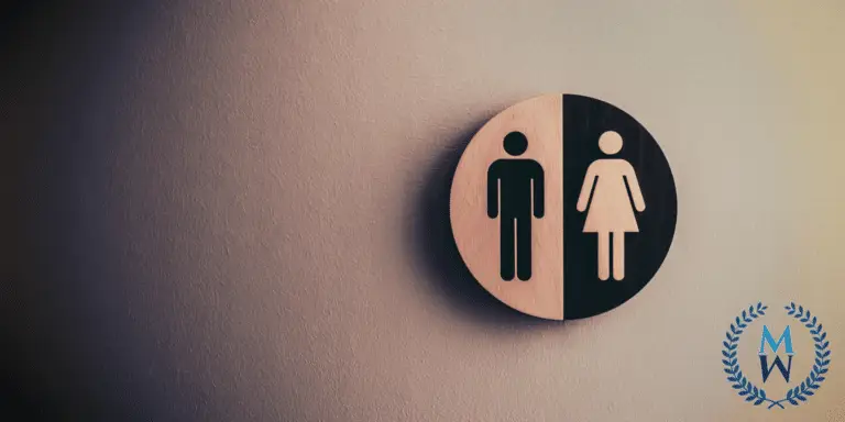 bathroom sign wiht female and male images