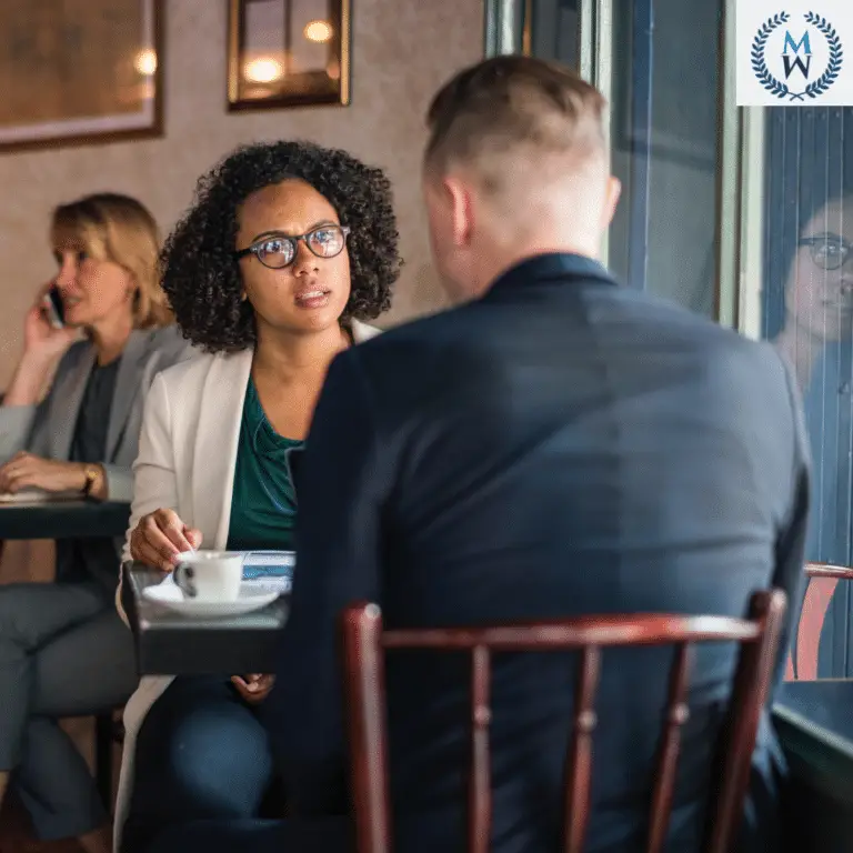 woman tlaking to man with concerned look