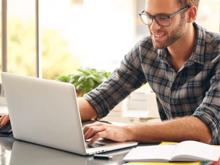 man on computer during online counseling